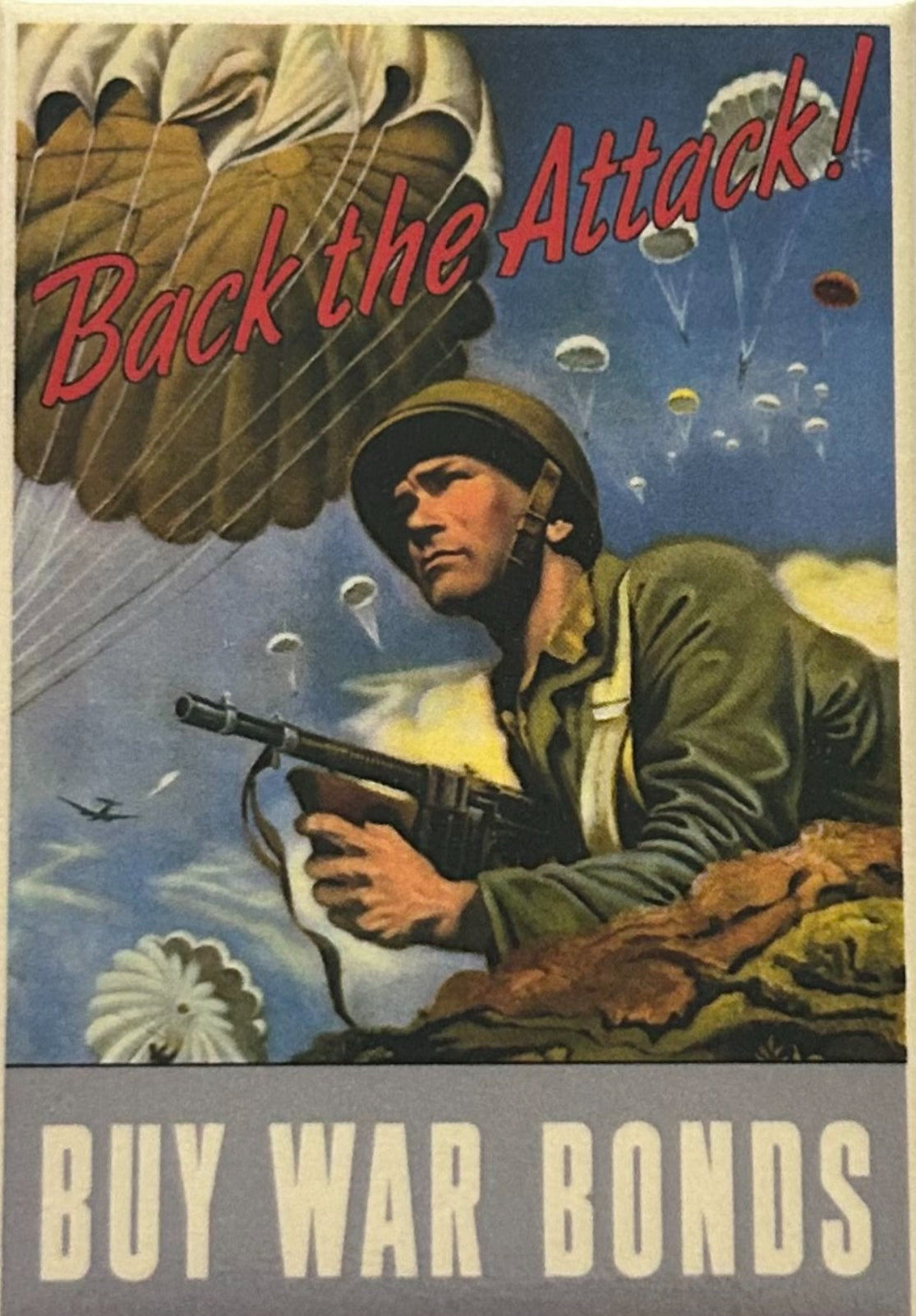 Back The Attack,US Army War Bonds Poster.On a 2”x3” Metal Refrigerator Magnet. Quality Glossy Finish With Strong Holding Power.